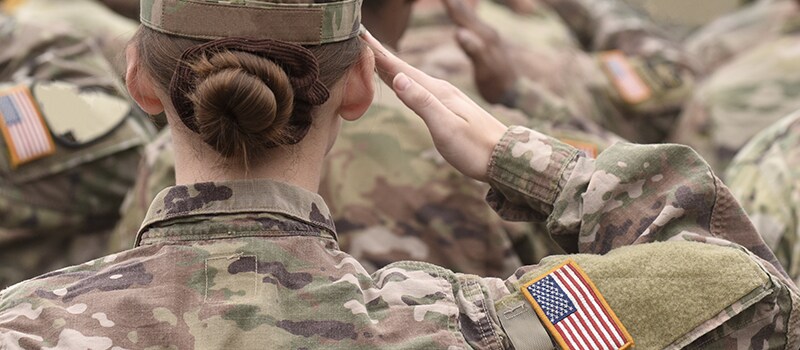 Female soldier saluting. 