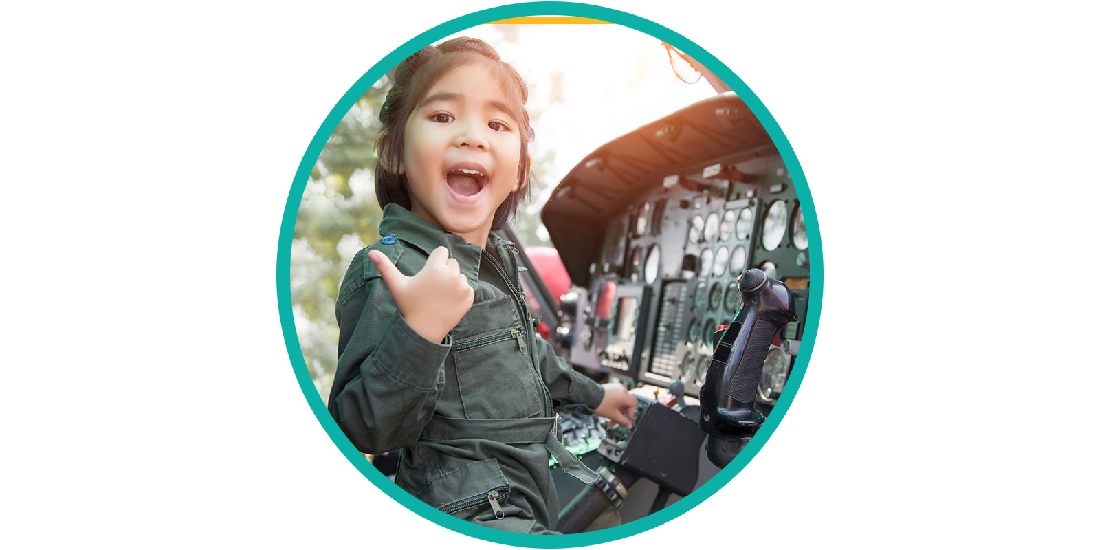 Young child with thumb up in airplain cockpit