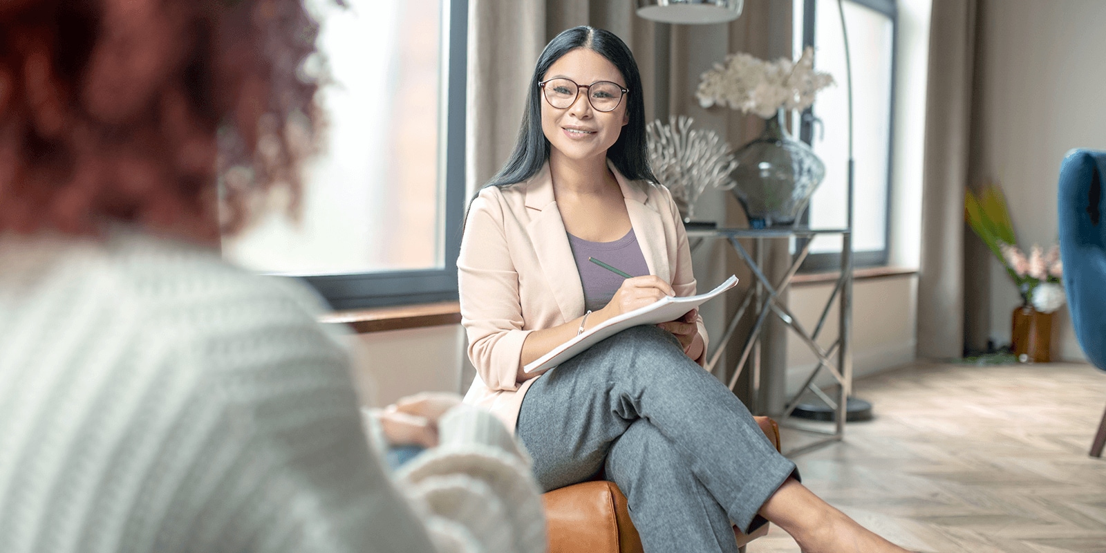 Woman with pencil and paper