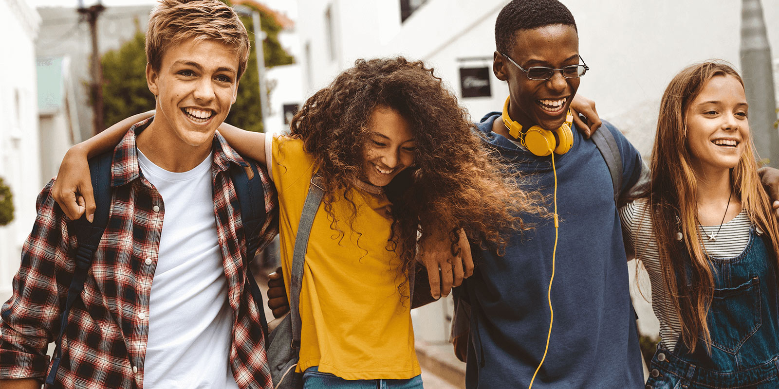 Group of diverse teenagers socializing