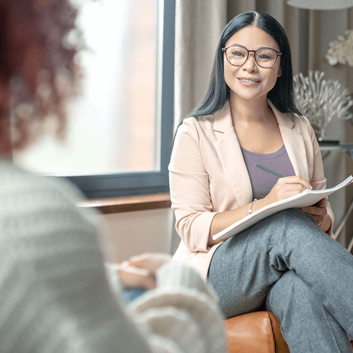 Clinician speaking with a patient. 