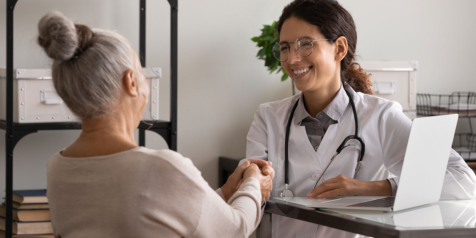 Clinician helping a patient.