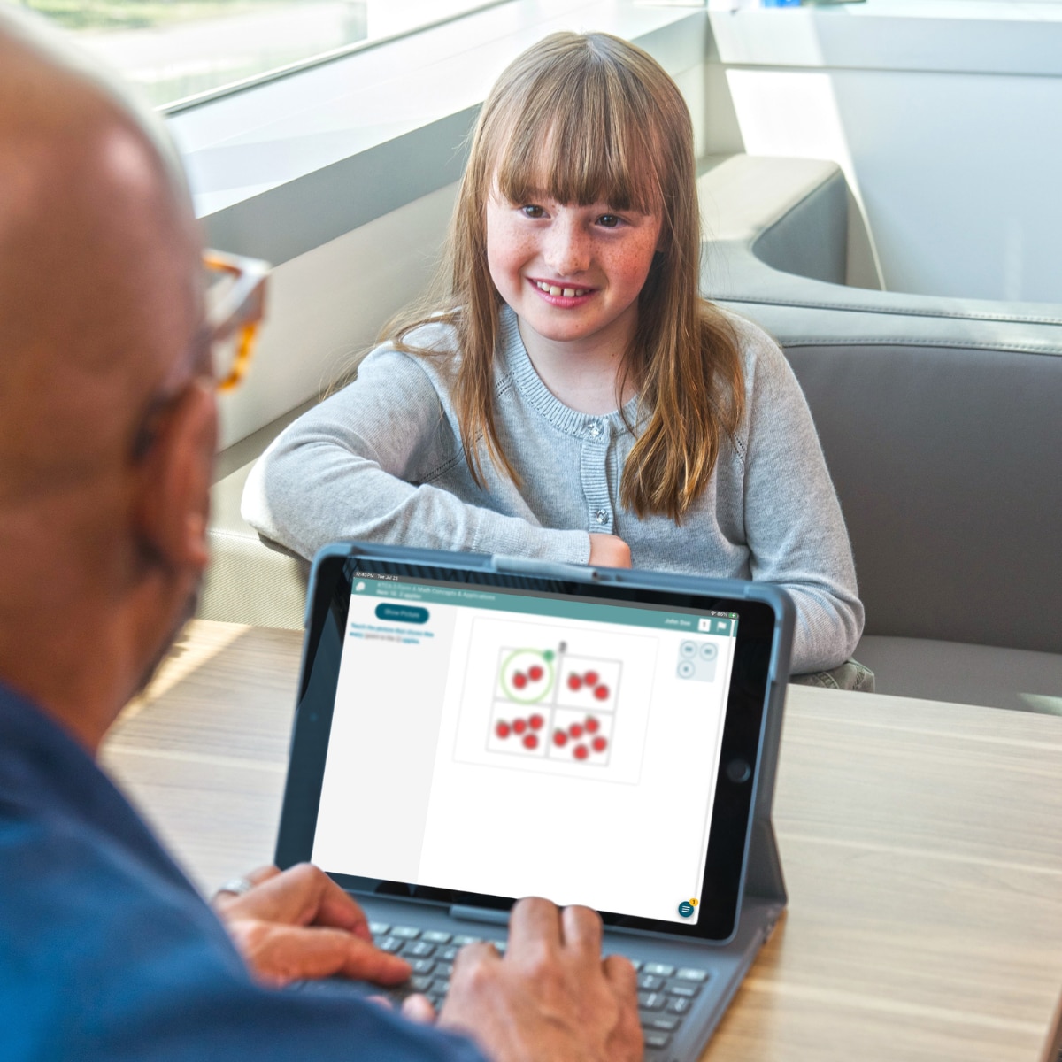 Young girl working on a tablet device
